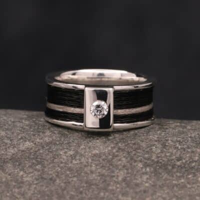 breiter silber ring mit gewebten pferde haaren und zikonia