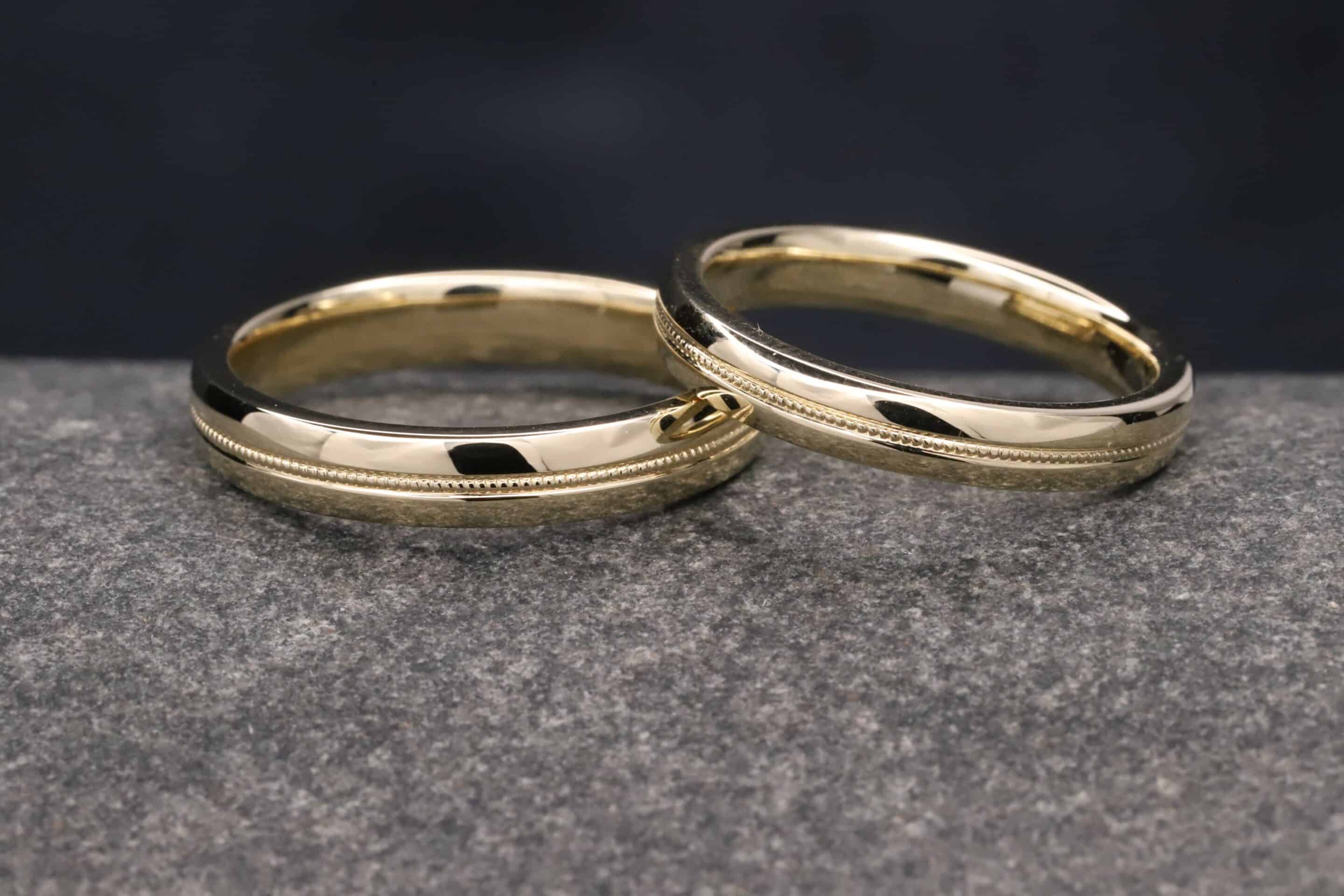trauringe in gelb gold mit millgriff / milgrain verzierung schmuckgarten aachen