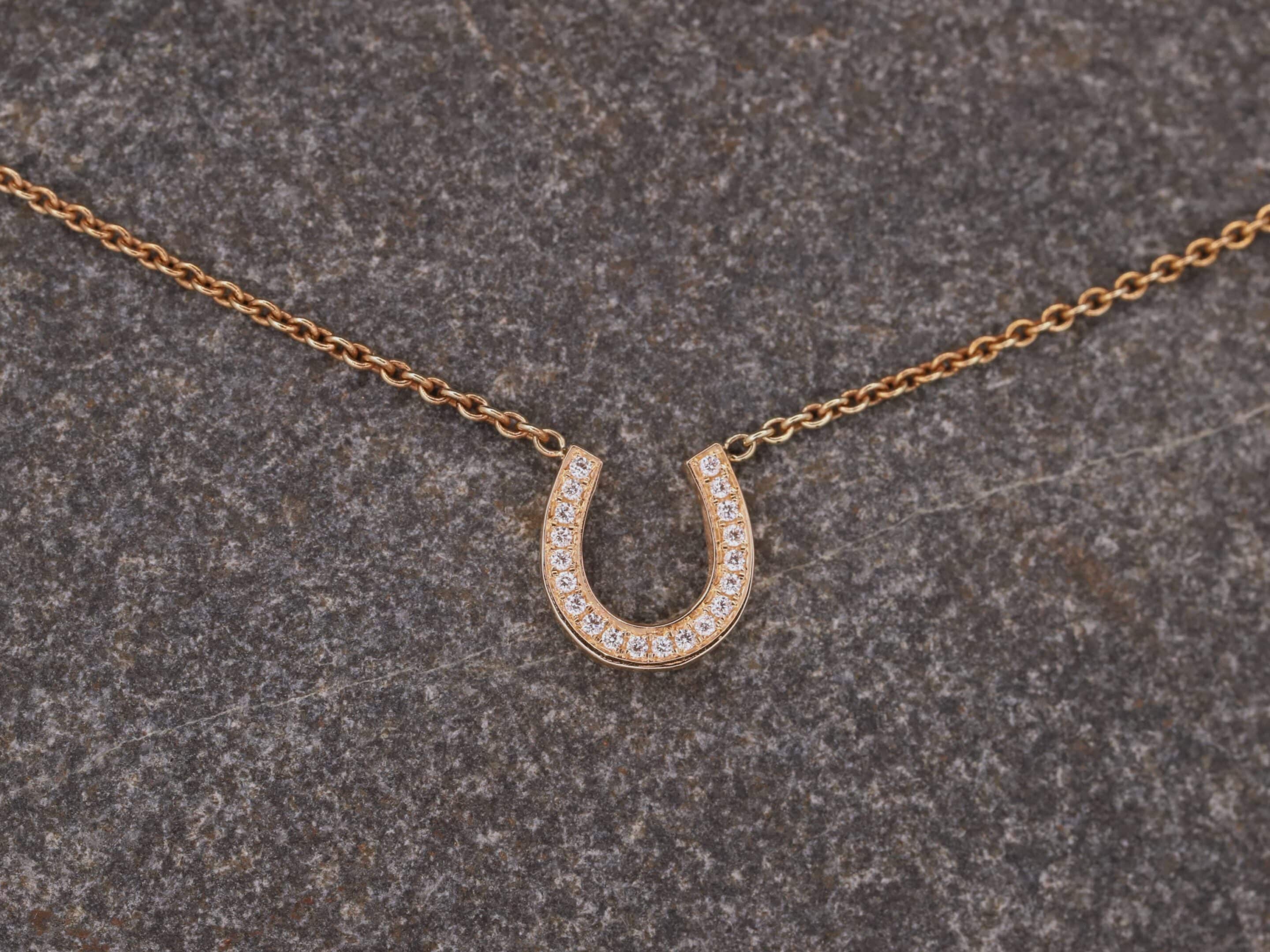 Hufeisen Collier in 585er Rosegold mit Brillanten