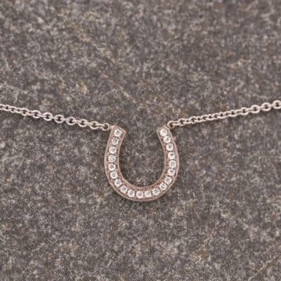 Hufeisen Collier in 585er Graugold mit Brillanten