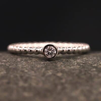 Verlobungsring 950er Platin mit 0,13ct synthetischem Diamanten im Brillantschliff