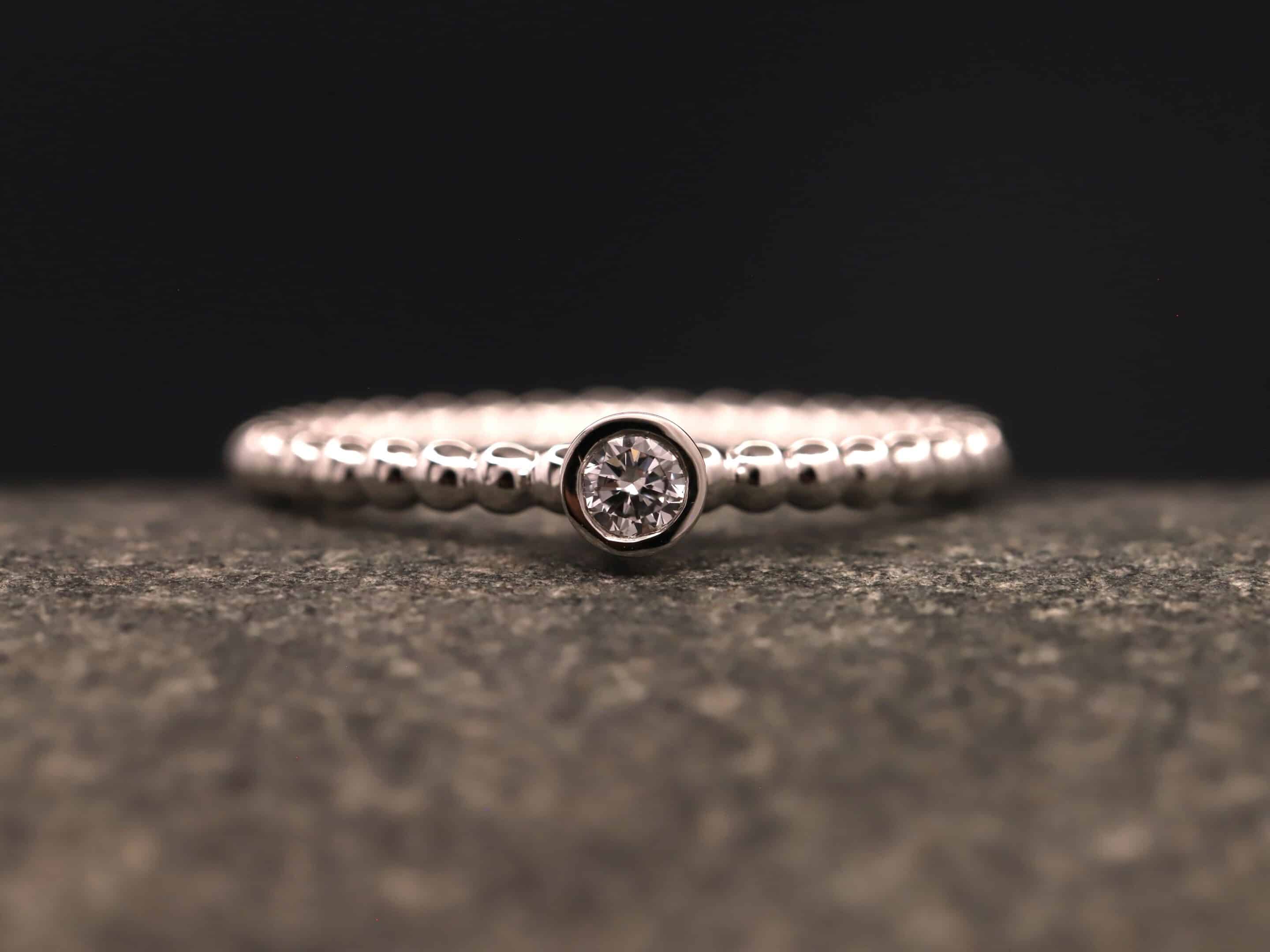 Verlobungsring 950er Platin mit 0,13ct synthetischem Diamanten im Brillantschliff
