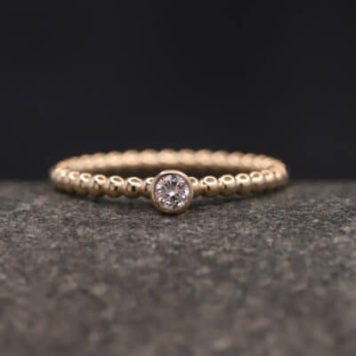 Verlobungsring 585er Rosegold mit 0,13ct synthetischem Diamanten im Brillantschliff